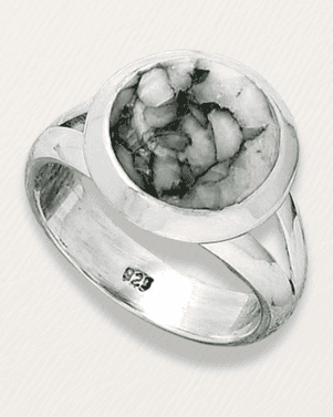 Silver ring with a green and white marbled stone on a white background