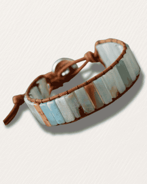 Striped bracelet with brown and blue pattern on a white background