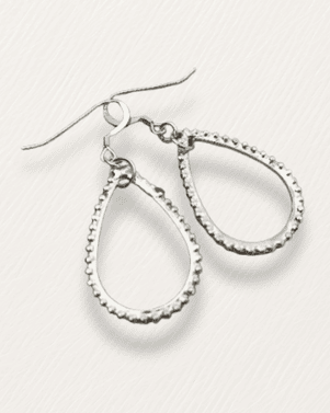 Silver teardrop earrings on a light gray background