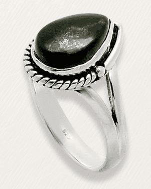Silver ring with a black stone on a white background