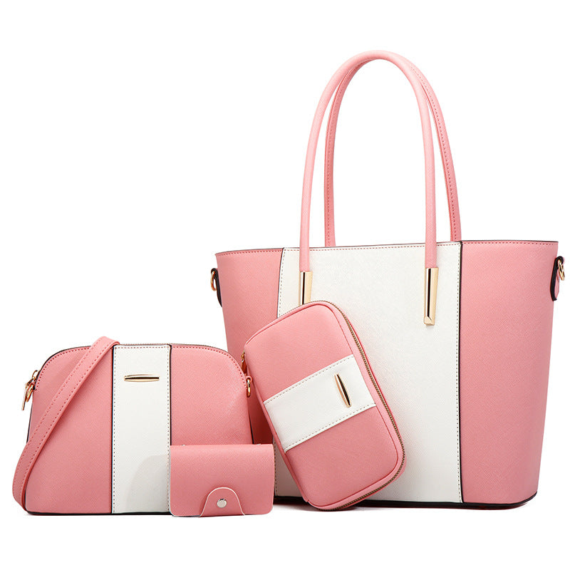 Set of pink and white handbags on a white background