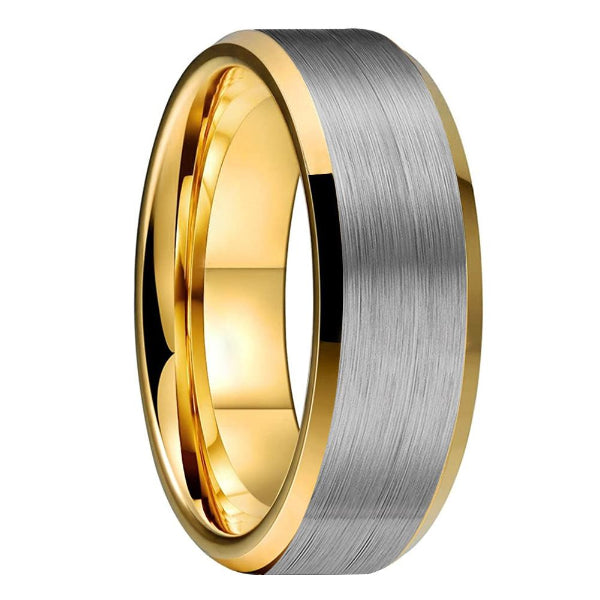 Two-tone gold and silver ring on a white background
