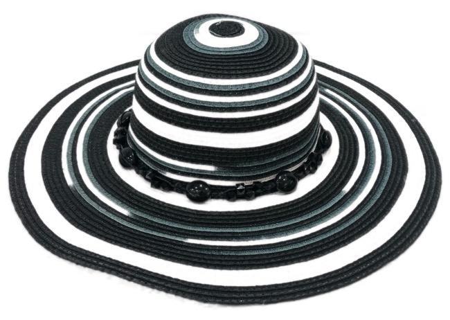 Black and white striped hat with decorative band on a white background