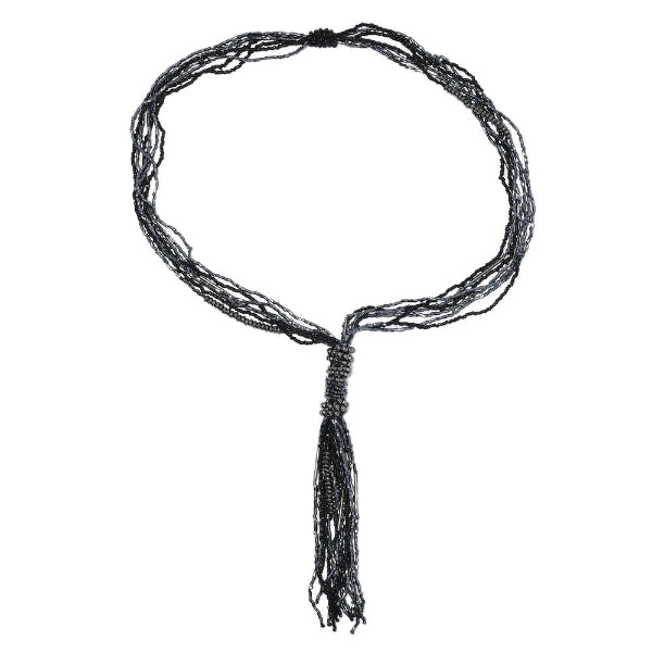 Black beaded necklace on a white background