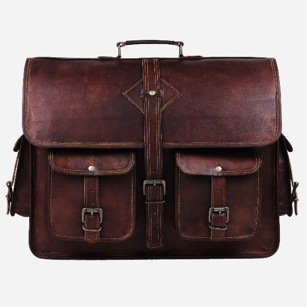 Brown leather satchel bag with multiple straps and buckles on a white background