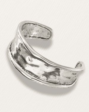Silver ring on a light gray background