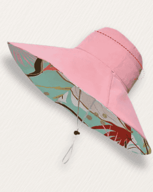 Pink bucket hat with floral pattern on a white background