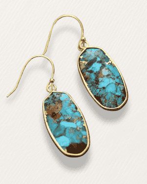 Turquoise stone earrings with gold accents on a white background
