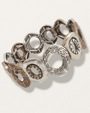 Silver and bronze bracelet on a light gray background