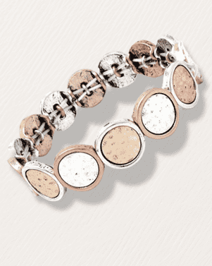 Bracelet with round, metallic beads on a light background
