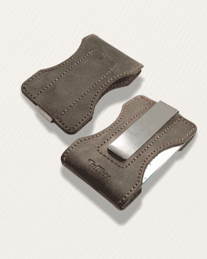Two brown leather money clip on a light gray background