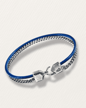 Blue bracelet with silver clasp on a white background