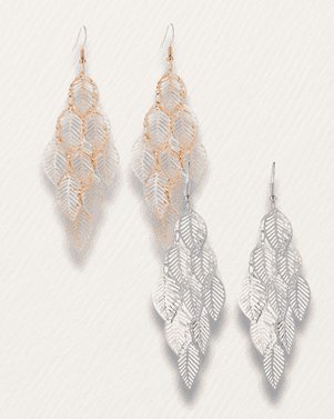 Pair of silver and gold leaf-shaped earrings on a light gray background