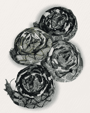 Black and white patterned fabric flowers on a white background