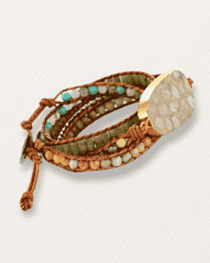 Multistrand bracelet with beads on a light background