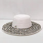 Boho straw sun hat with animal-print band, women’s summer accessory