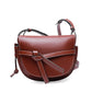 Brown leather handbag on a white background