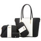 Black and white handbag set on a white background