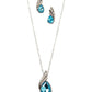 Jewelry set with blue teardrop pendant necklace and earrings on a white background