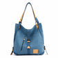 Blue handbag with brown accents on a white background
