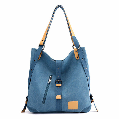 Blue handbag with brown accents on a white background