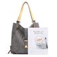 Gray handbag with yellow strap and 'Minimalist Magazine' on a white background