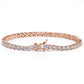 Rose gold bracelet with clear stones on a white background