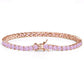 Rose gold bracelet with pink gemstones on a white background