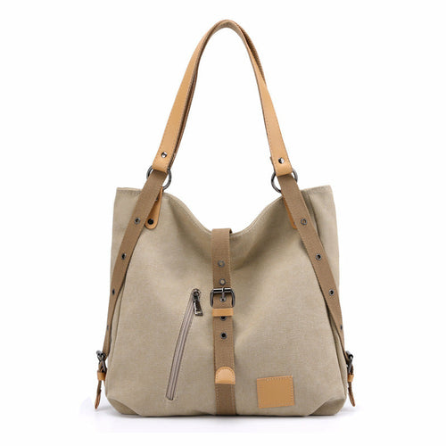 Beige handbag with brown straps on a white background