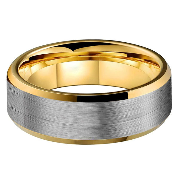 Two-tone gold and silver ring on a white background