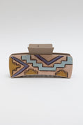 Clutch bag with geometric pattern on a white background