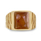 Gold ring with a rectangular stone on a white background