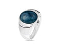 Silver ring with a blue stone on a white background