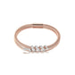 Rose gold bracelet with diamond accents on a white background