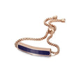 Rose gold bracelet with a blue bar on a white background