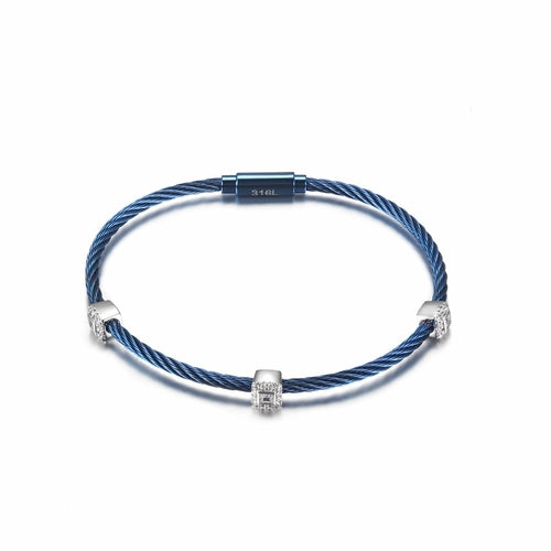 Blue braided bracelet with silver clasp on a white background