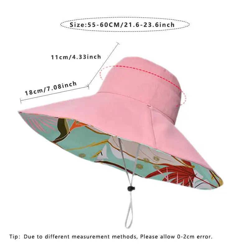Pink sun hat with colorful brim and measurement details on a white background