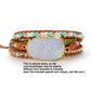 Multistrand beaded bracelet with a large natural stone focal point on a white background.
