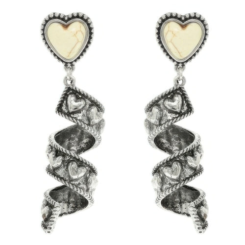 Spiral earrings with heart-shaped gemstones on a white background