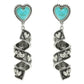 Turquoise heart-shaped earrings with silver spiral designs on a white background