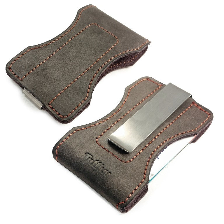 brown money clip with orange stitching