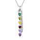 Silver necklace with five heart-shaped gemstones on a white background