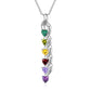 Silver necklace with heart-shaped gemstones and engraved names on a white background