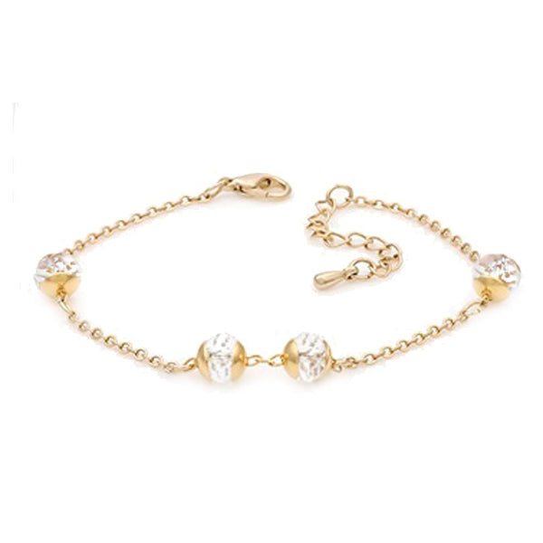 Gold bracelet with pearl-like beads on a white background