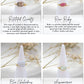 Four crystal cones with gemstones on white stands, each labeled with a different stone type and its properties.