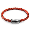 Red braided leather bracelet with a silver clasp on a white background