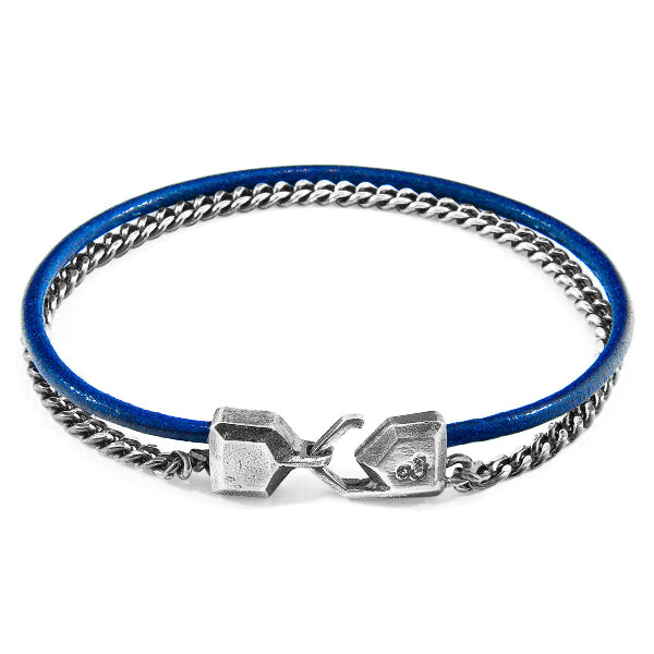 Blue bracelet with silver chain and clasp on a white background