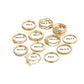 Set of gold rings with labeled sizes on a white background