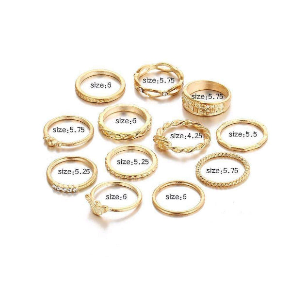 Set of gold rings with labeled sizes on a white background