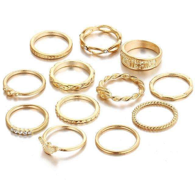 Set of gold rings on a white background